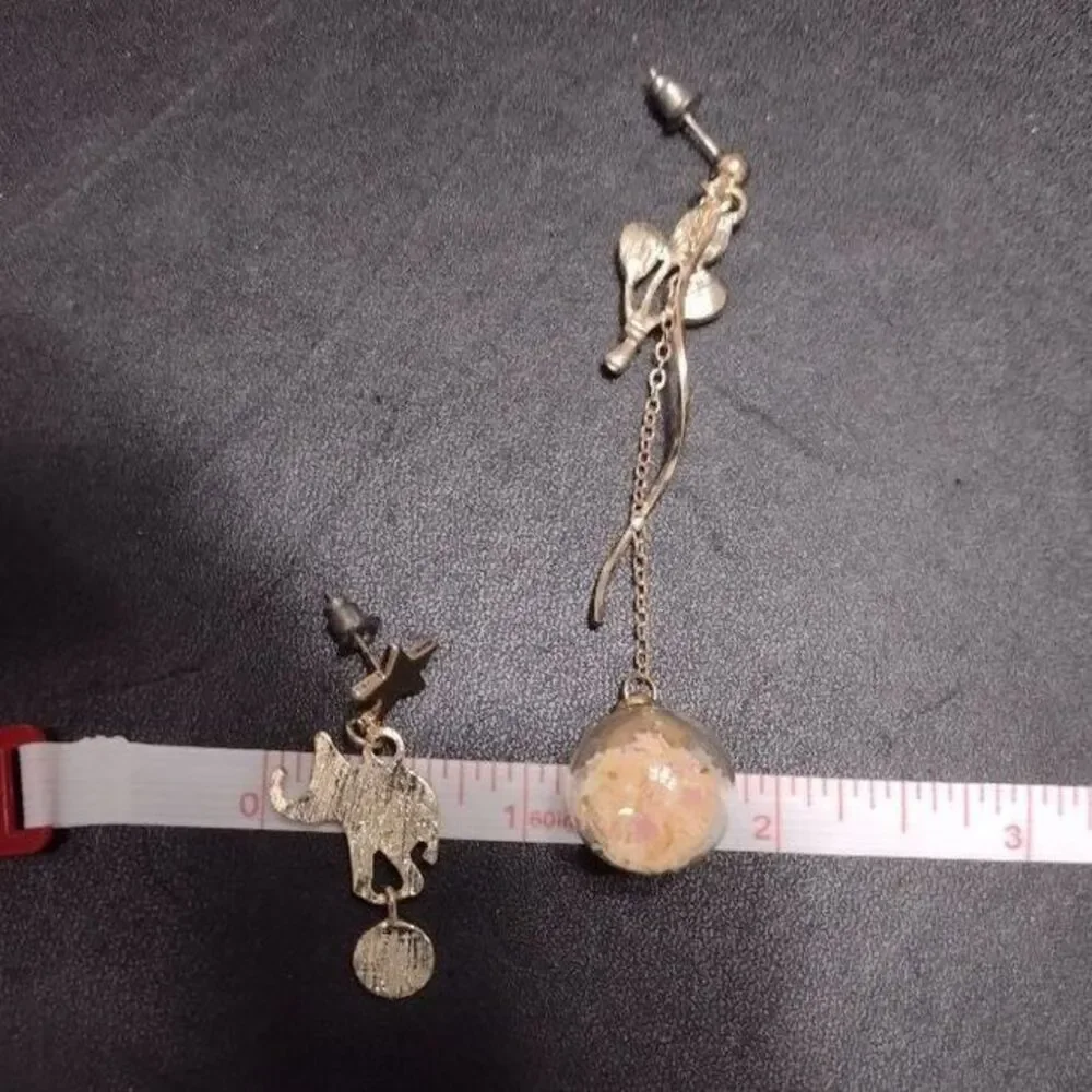 Circus high low earrings